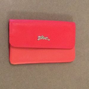 Pink Longchamp flap wallet